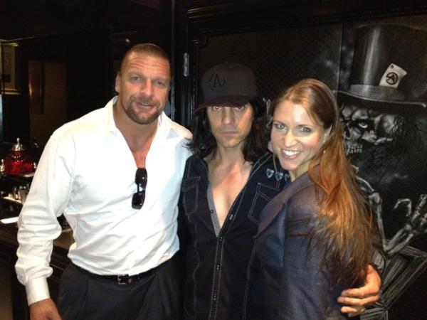 An injured Triple H was spotted wearing a brace on his left arm while meeting with illusionist <a href="/CrissAngel/">Criss Angel</a> yesterday.
