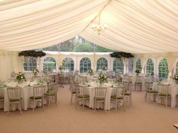 A beautiful wedding marquee in the Wirral with an apple green theme