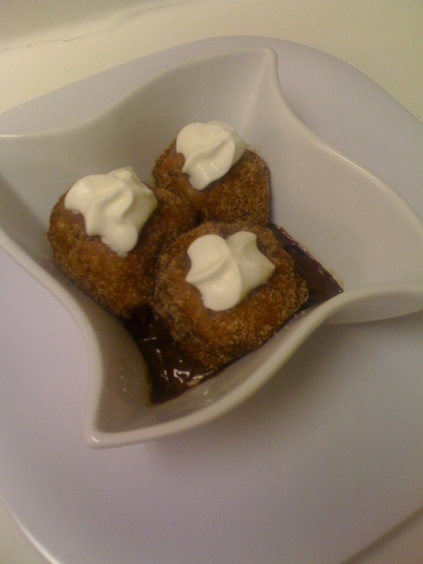 DelightfulChef's tweet photo. Zeppoles with Chocolate Sauce http://t.co/sbQeL17m