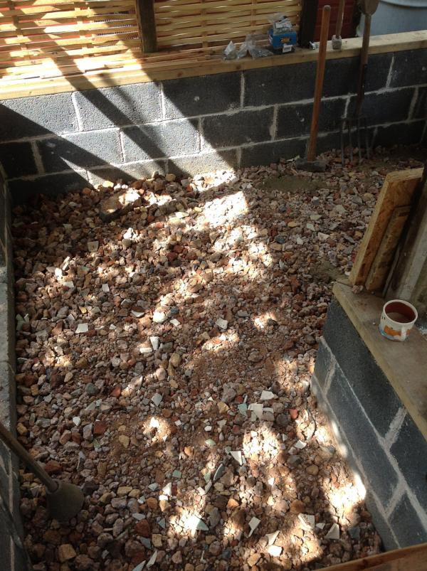 UnderhillCraig's tweet photo. Smashing all this recycled brick and concrete to make the floor level was strangely satisfying. Limecrete to go on top http://t.co/nplJgRra