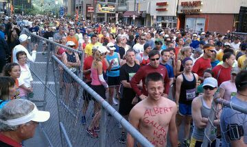Oldland26's tweet photo. My brother ran in the Pittsburgh Marathon today of course he's the idiot with no shirt http://t.co/gUBJ1K7D