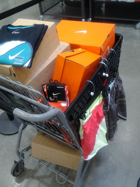 whitedenim's tweet photo. Clean up on isle swag. FULL cart at NIKE employee store. spent the fucking limit http://t.co/XdjKPRem