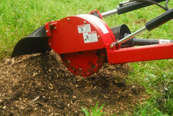 Stump gone, deep below the surface! Now this area can be tilled and seeded. Amazing power of a McCormick tractor PTO!