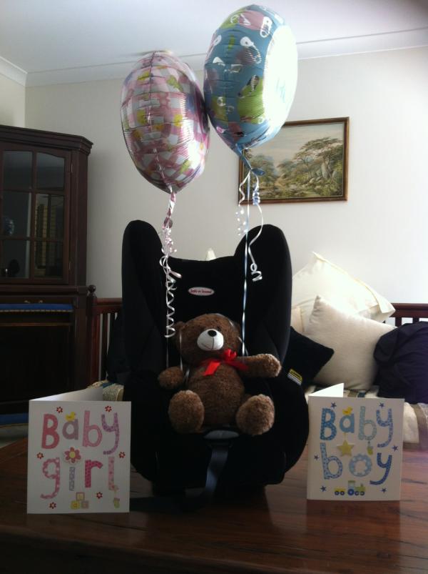 Baby shower gift. So far more guesses for a girl. Car got stolen this week so we need a car to put the seat into! LOL