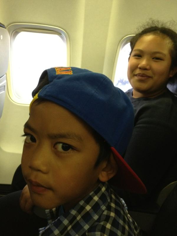 rizza_belle's tweet image. Leaving on the jet plane! Bam is not too happy because his sister got the window seat first! #canjet