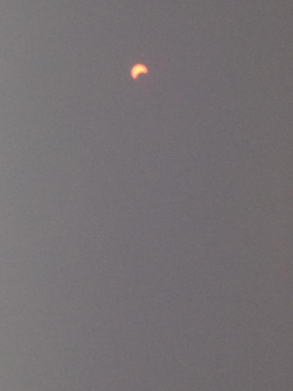 Killburn37's tweet image. This is a photo of the partial eclipse taken with my iPhone through eclipse glasses