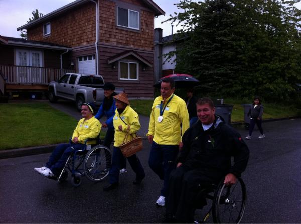 rhrelaymedia's tweet photo. Rick wheeling w/ National Cheif Shawn Atleo @NCAtleo #RickHansenRelay as it visited the Musqueam community. http://t.co/y8cU0Cxy