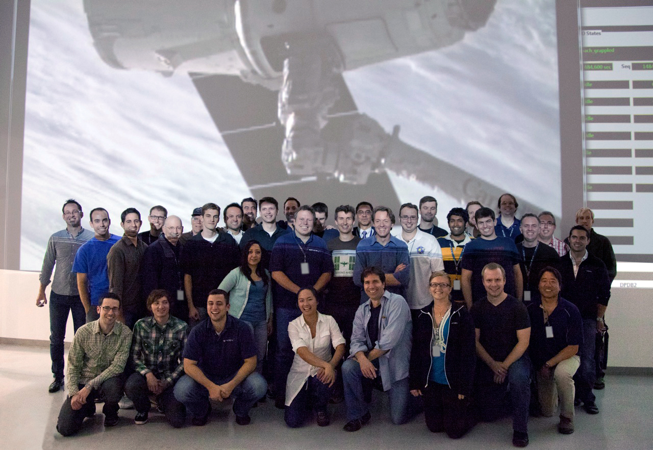 SpaceX on X: "The SpaceX mission control team after the successful  grappling of #Dragon. http://t.co/G6K0fhRN" / X