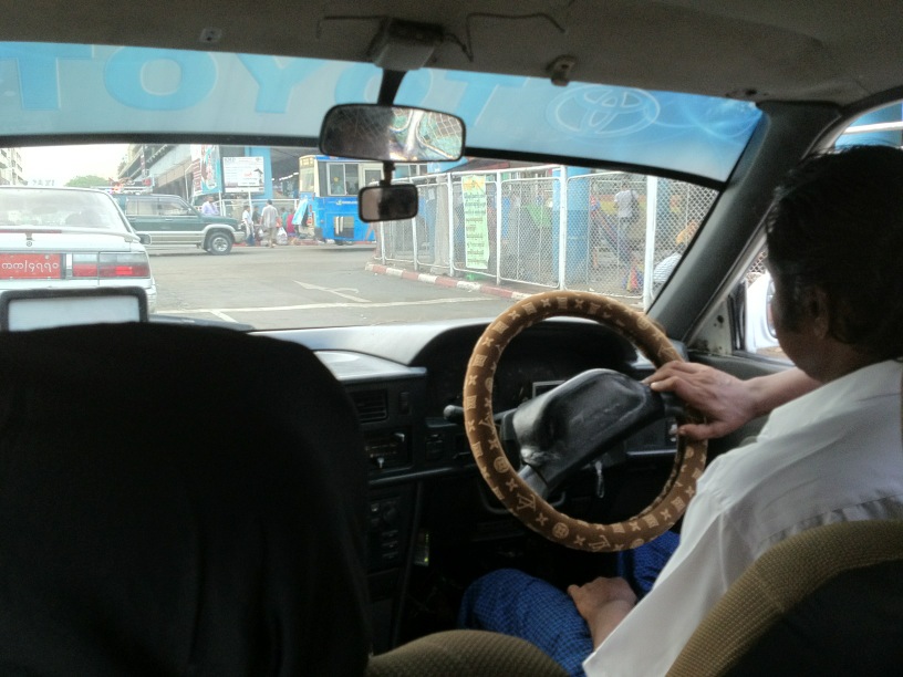 Aaron Connelly on X: Yangon taxi driver has nice Louis Vuitton steering  wheel cover.  / X