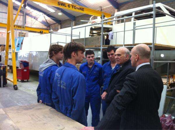 Vince Cable meets apprentices at Griffon Hoverwork- UK's world leading hovercraft manf #BISvisits bit.ly/MK7Dqm