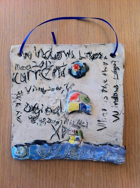 bruienne's tweet image. My son&apos;s ceramic art project? Why, a history of the Windows logo of course. #nerdspawn