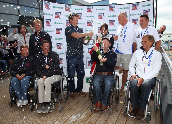 SonarTeam's tweet photo. Champagne fight on the podium at Sail for Gold! Priceless! http://t.co/ZdGdMakW