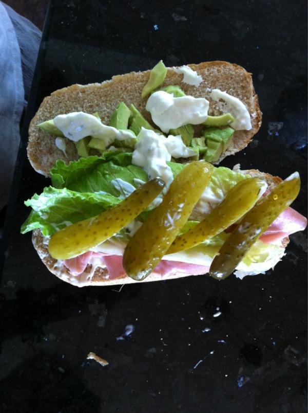 #worldsbestsandwich is now in my stomach. #avocado #pickles #mayo #tzatziki #honeyham #lettuce #brownbun #mmmmm