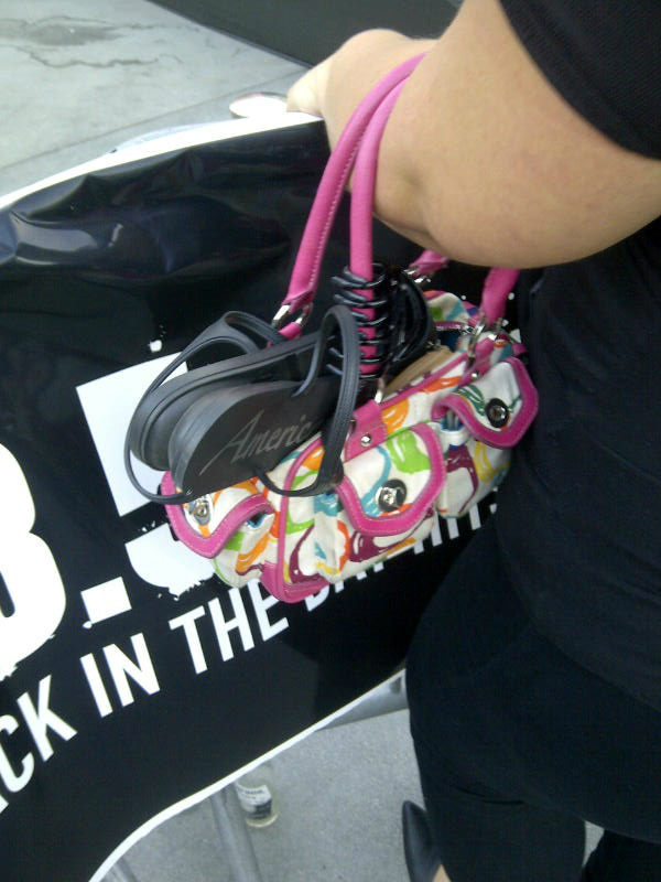 SDub7's tweet image. I guess flip flops and multi-colored Coach bags do go together. #TheFWord #styleproblems