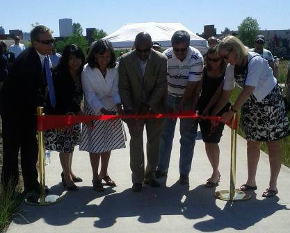 Ribbon cutting ceremony for our South Platte River Redevelopment project. Check out our CEO Juan with Mayor Hancock!