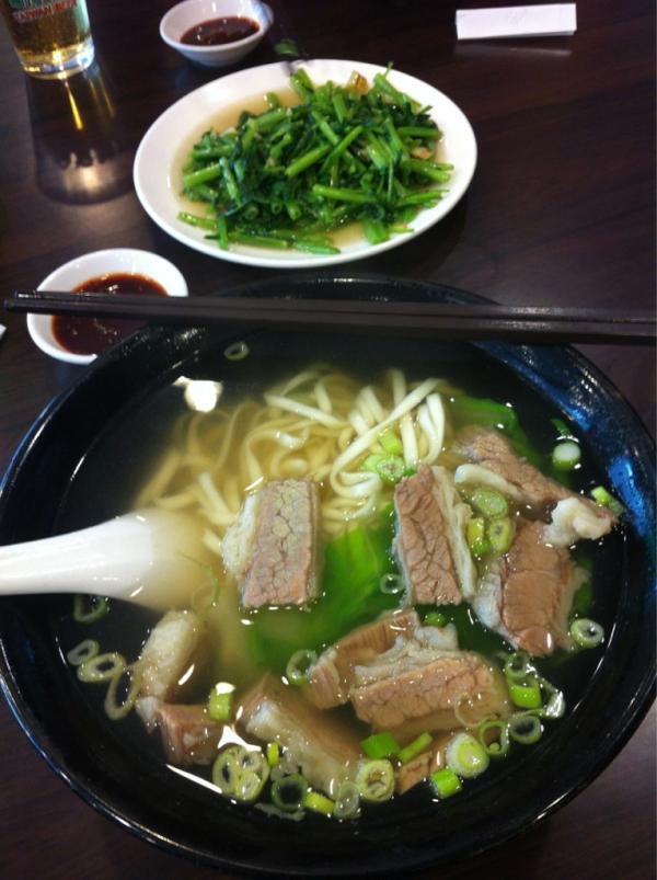 Bourdain's tweet photo. Taiwanese beef noodle . Also water spinach with garlic. http://t.co/UaLeiNQ6