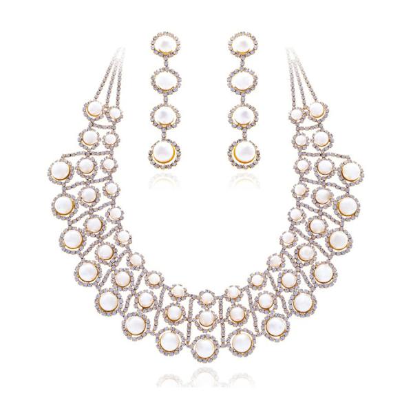 crystalcute002's tweet photo. The round shaped necklace and earrings set inlaid with Rhinestones&amp; ivory pearls http://t.co/CQWtPoa9