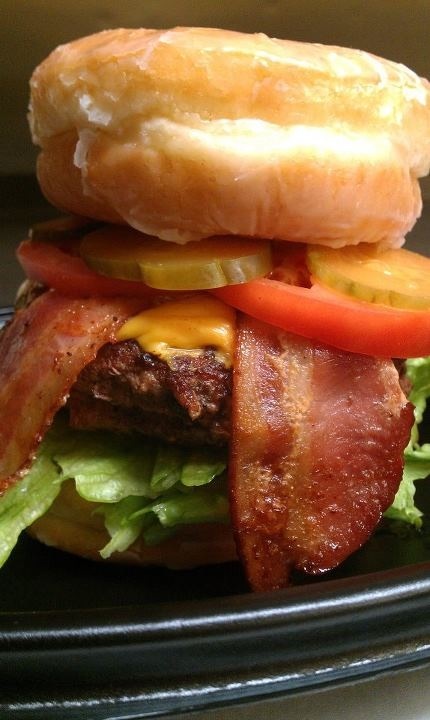 donutkingfl's tweet photo. This is our 1/2 lb donut burger served between two glazed donuts. http://t.co/Izk5SR6l