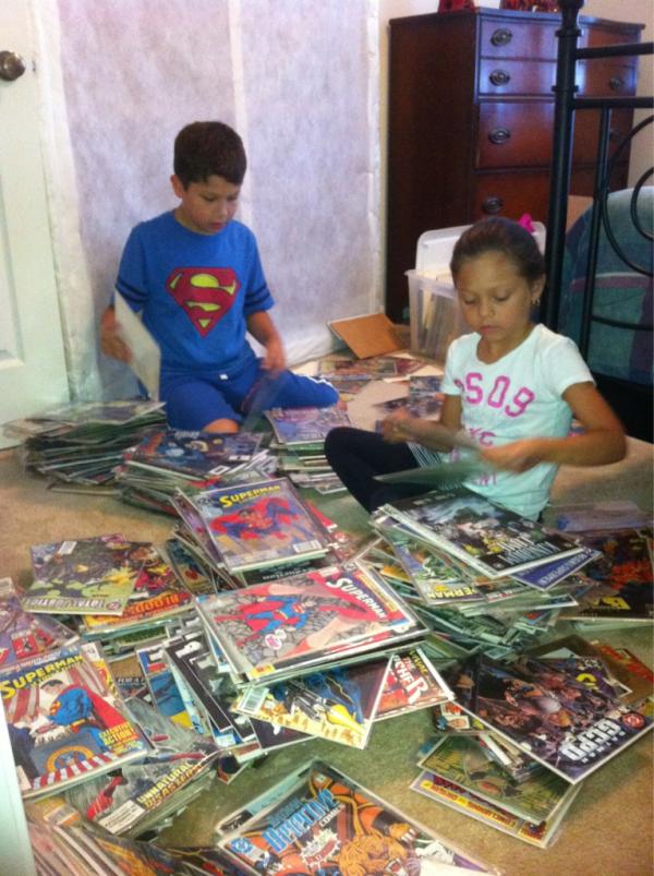 ana_griffiths's tweet photo. Hi! It is amazing how much time the kids are putting into arranging their daddy's old comics... They love them!!!! http://t.co/pnHDVE0r