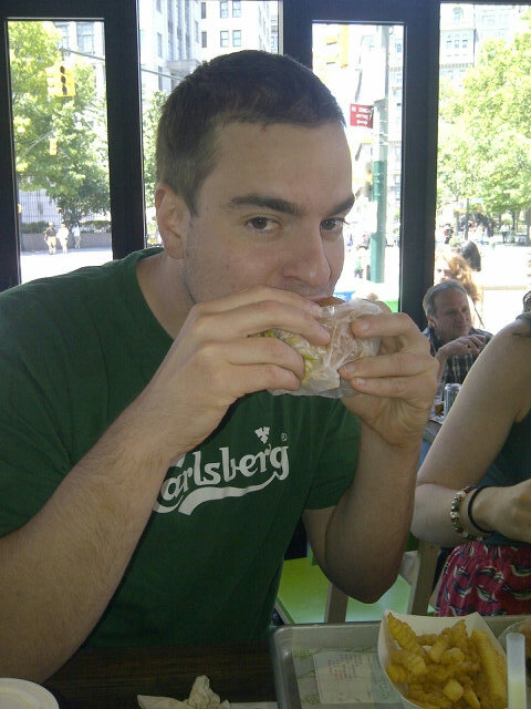 TheRealJStelmok's tweet photo. Gregger enjoying an awesome shake shack burger @shakeshack http://t.co/xLM0o9GR