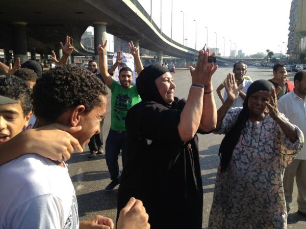 NotMorsy's tweet photo. And this will be your only time RT @adamakary: Never saw dancing in the street like this before. #Egypt http://t.co/XL2rmfjp