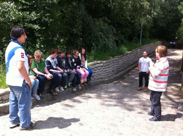 Mrs M explaining the medical aid stations at Essex farm cemetery.