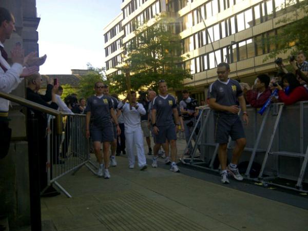 Carys Hall with the flame at #BarkersPool