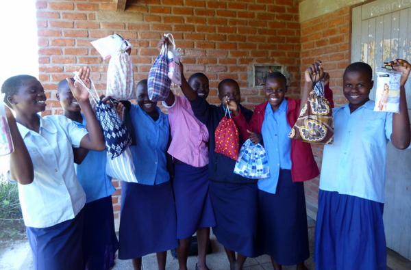 DaysforGirlsUK's tweet photo. Beautiful picture of girls in Malawi receiving our first batch of kits! http://t.co/Aq6vagzc