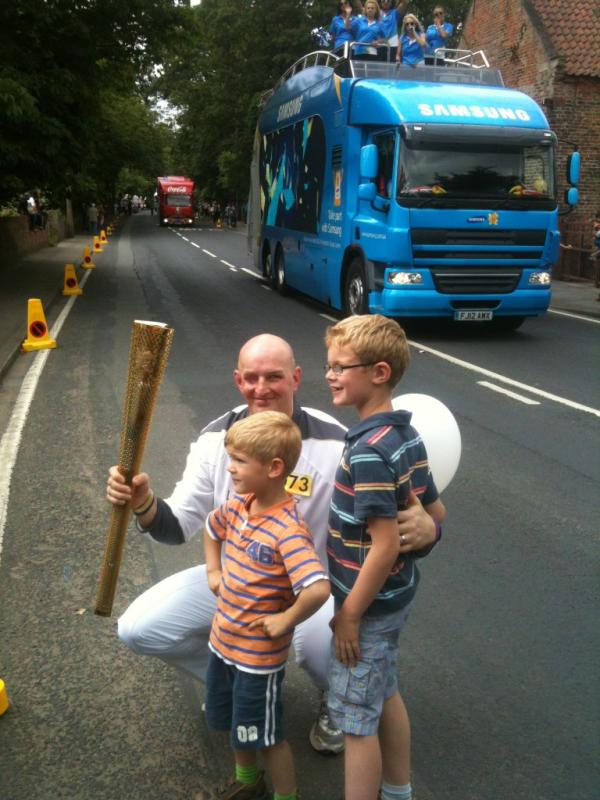 Here's our man ready to go with the #olympictorch