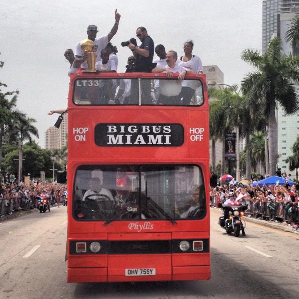 Team_JAI's tweet photo. Yesterday's HEAT Championship Parade was amazing! Anyone recognize this guy or the big gold thing he's holding?! http://t.co/i2GxpLyh