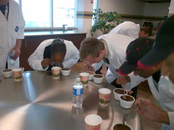 SonjaOps's tweet photo. @TH_University Participants getting their morning hit--cupping style! http://t.co/MSMXnt95