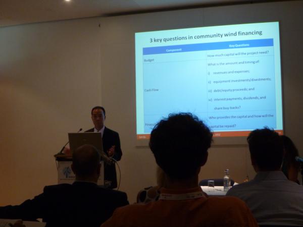 Tom Du presents crowdfunding best practices for RE projects @ the 2012 World Wind Energy Conference in Germany