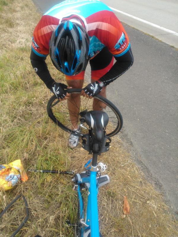 JPDeCuire's tweet photo. #CSSMalawi 30 miles left and got a flat...now we have to pass all of those people again :(. http://t.co/5sLmNEsH