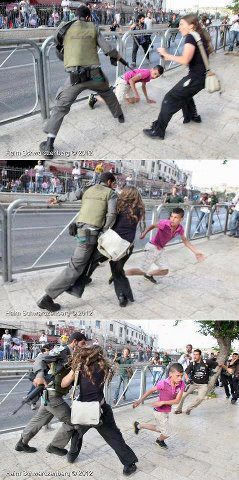 أحدالجنود الإسرائيلي كان يحاول اعتقال طفل فلسطيني لكن اعترضته الناشطةاليهودية "ساهر فاردي" لتمنعه..الإنسانية لا دين لها