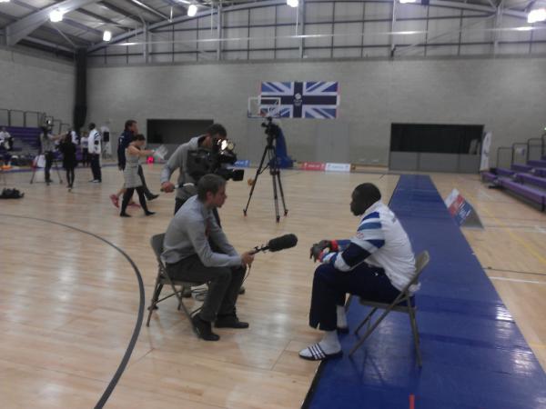 TeamGB's tweet photo. [PHOTO] @TeamGB Basketball athlete Luol Deng talking to media following his announcement into #OurGreatestTeam http://t.co/NspcZXEc
