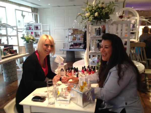 _JamesFoster's tweet image. Check out miss Azmi working hard at the Tesco Christmas in July.