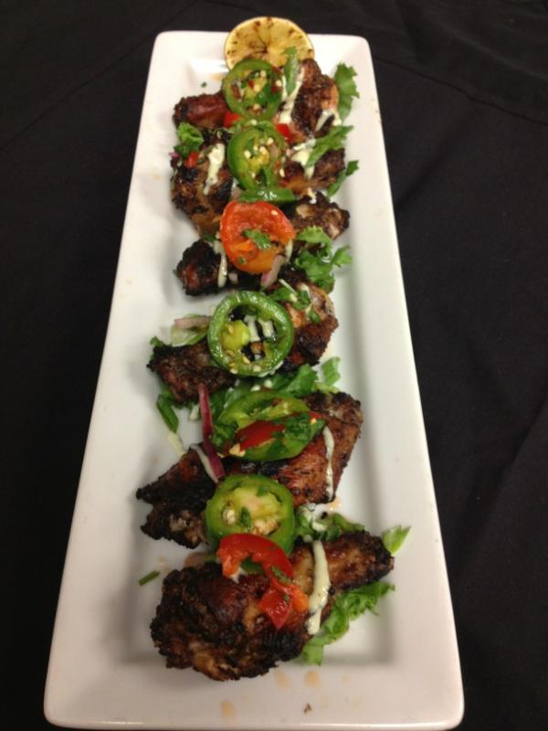 heechino's tweet photo. Jamaican jerk apple wood smoke char grilled wings, scotch bonnet and jalapeño pickled vinaigrette drizzled. http://t.co/Na398opN