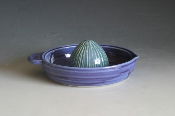 Another piece from yesterday's firing - a citrus juicer! It's full of rough edges to grab the pulp of your fruit.