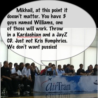 StayDwight's tweet photo. Magic GM Rob Hennigan on the phone with the Nets. How the conversation is going. @DavidBaumann33 @YoTonyFernandez http://t.co/4HKPCd1H