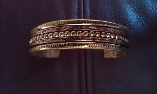 WildHorseDesig1's tweet image. Check out this bracelet our artist Bill DoBell just finished. It is made from copper and brass.