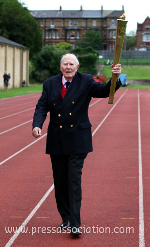Legendary athlete Sir Roger Bannister carries the #OlympicTorch at Iffley Road Stadium, Oxford.