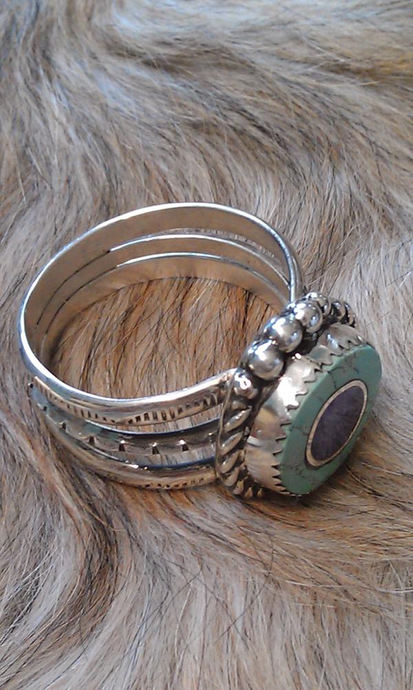WildHorseDesig1's tweet image. Here is a beautiful ring made by Bill it is Silver with a Turquoise stone inlaid with Charoite. What do you think?
