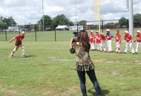 Following the FOX News TV interview, Coach JJ attempts to impress the sports reporter with a classic Rebel mud dive!!!