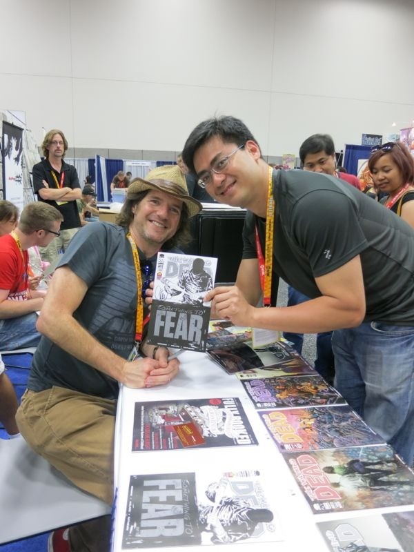 jaimedaez's tweet photo. Getting my copy of Walking Dead 100 signed by artist Charlie  in #SDCC http://t.co/hW7a8DsF