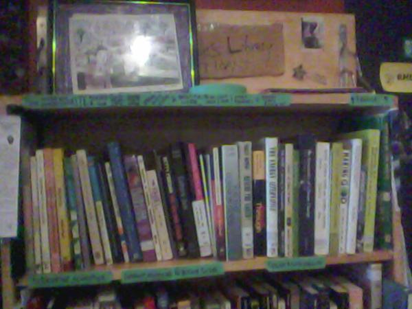 OccVanLibrary's tweet image. Just finished organizing the #Occupy library at Rhizome Cafe. Now #99% easier to find the book you want! #Vancouver
