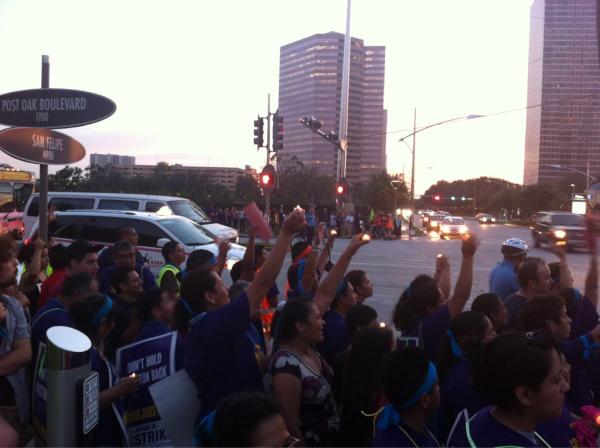SEIU's tweet photo. RT @SEIULocal1: The @SEIU #houstonjanitors strike is growing. Janitors march through #MillionaireCity http://t.co/VcVZ6iOF