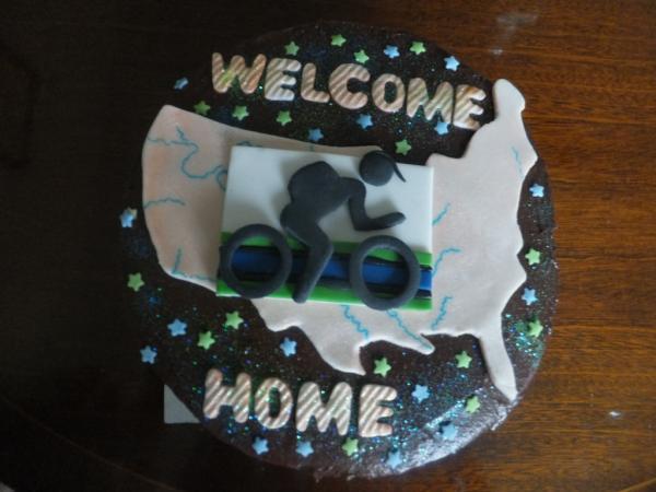 BpacktoBikeRack's tweet photo. Awesome welcome home cake http://t.co/1OqpkpOF