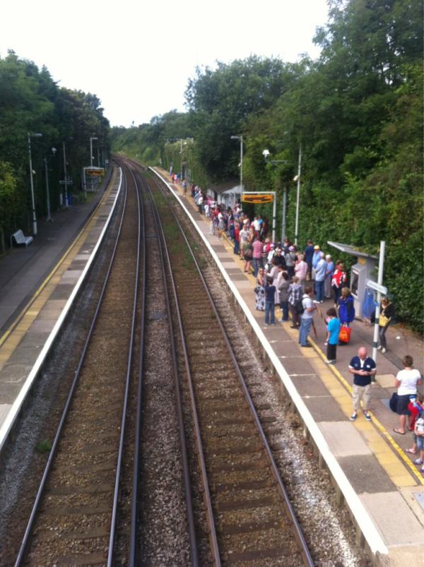 bearegreen's tweet photo. Olympic fever hits Holmwood station as people come out to support GB's Cav rocket. #London2012 #bearegreen http://t.co/FiBzN8pV