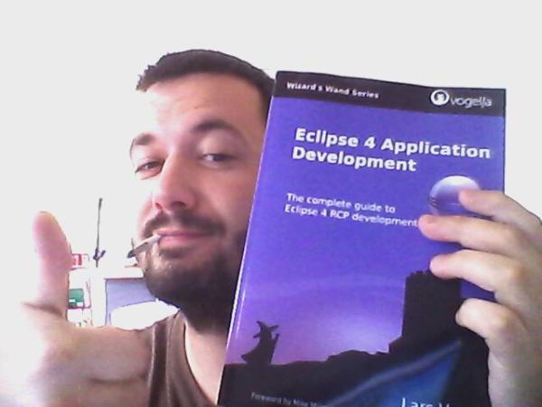 xavier_seignard's tweet image. #eclipse4 book by @vogella just arrived! at the same time as my #octocat stickers! great geek day!