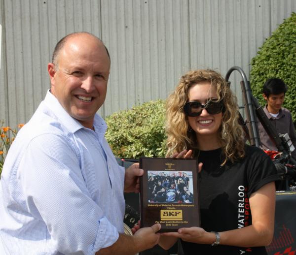 <a href="/joaoricciarelli/">joao ricciarelli</a> presented with a plaque in appreciation of SKF support of 2012 University of Waterloo FSAE team